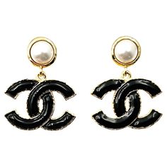 Chanel Brand New Gold Pearl Black CC Medium Dangle Piercing Earrings *Marked 23 *Made in France *Comes with the original box and pouch *Brand New -It is approximately 1.3"x 1". DDAB4273-00682DD Chanel Earrings Pearl, Chanel Pearl Drop Earrings, Chanel Dangle Earrings, Chanel Gold Earrings, Black Chanel Earrings, Chanel Pearls, Chanel Brand, Chanel Accessories, Contemporary Earrings