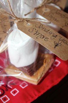 some cookies and marshmallows wrapped in plastic