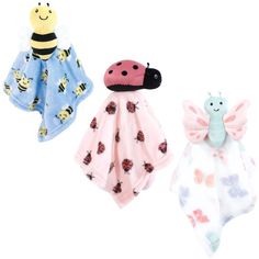 three baby bibs with ladybugs, bee and ladybird designs on them