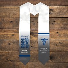 Our Personalized Law or Medical Graduation Stole is the perfect way to commemorate your graduation day! Personalize this graduation keepsake with your choice of colors, Medical or Law icon, year, name and 3 custom message lines. With a wide variety of colors to choose from, you can create a unique graduation accessory to highlight your academic journey! Stole Details: Measures 5" W x 72" L Polyester satin Item #U22219151 Adjustable White Graduation Accessories, White Adjustable Graduation Accessories, Adjustable White Graduation Cap Topper, Personalized Graduation Cap Topper As Graduation Gift, Customizable Graduation Cap Topper As Gift, Customizable Graduation Cap Topper For School, Customizable Graduation Cap Topper, Customizable Graduation Stole For School, Personalized Graduation Stole