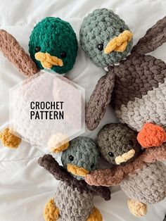 four crocheted stuffed animals laying on top of a white sheet with the words crochet pattern above them