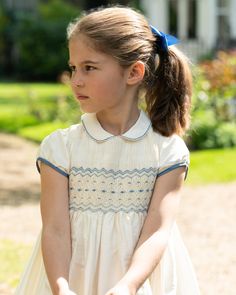 Exquisite, delicate and stunning looking 100% Dupioni silk celebration girl dress. Elegant ivory colour with subtle contrasting deep blue details, delicately hand embroidered smock and silk covered buttons. The perfect dress to wear for any special occasion, flower girl, garden party or a special birthday to come. Linen Aesthetic, Beatrice Blue, Silk Dress Blue, Kid Dress, Hand Smocked Dress, Ivory Colour, Girls Special Occasion Dresses, Blue Silk Dress, Dupioni Silk