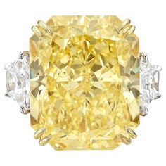 This Stunning Antinori di San Pietro ROMA GIA Certified 10.35 Carat Fancy Yellow Diamond is made in 18K white and Yellow Gold. The 2 white diamond trapezoid on either side of the center stone are 100% eye clean and full of brilliance. VVS2 Clarity 20 Carat Diamond Ring, Radiant Diamond Rings, Flawless Diamond, Colored Diamond Rings, Fancy Yellow Diamond, Three Stone Diamond, Radiant Cut Diamond, Radiant Diamond, Three Stone Engagement