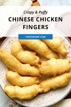 crispy and puffy chinese chicken fingers on a white plate with text overlay