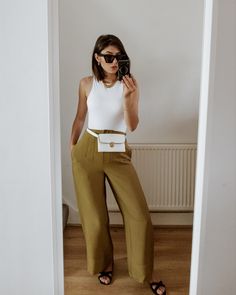 Zara white bodysuit, wide khaki trousers, belt bag. #zarastyle #khaki #trousers #widelegpants #minimalstyle #minimaloutfit #neutralstyle White Bodysuit Outfit, Bodysuit Outfit, Khaki Trousers, Body Suit Outfits, Zara Fashion, Minimal Outfit, White Bodysuit, Zara White, Neutral Fashion