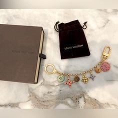 Gorgeous Bag Charm Chain That Never Got Used. I Loved This When I Bought It But It’s Just Been In The Box. Questions? Leave A Comment Below! Louis Vuitton Bag Charm, Lv Bag Charm, Louis Vuitton Jewelry, Charm Chain, Bag Charms, Gorgeous Bags, Key Chains, Leave A Comment, The Box