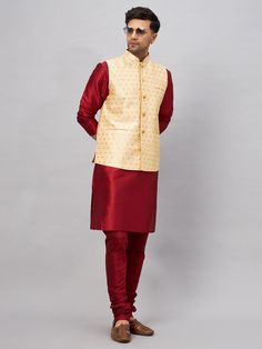 VM By VASTRAMAY Men's Gold Zari Weaved Jacket With Kurta Pyjama Set Experience elegance and tradition with this stunning set, featuring intricate gold zari weaving. Ideal for festive occasions or special events, it offers a blend of style and comfort. Features Gold zari weaved design Elegant and traditional Comfortable fit Specifications Material: Kurta & Pyjama - Silk Blend, Jacket - Cotton Blend Fit: Regular Sleeves: Kurta - Full Sleeves, Jacket - Sleeveless Length: Kurta - Knee Length Materia Traditional Long Sleeve Outerwear For Diwali, Traditional Sets With Traditional Drape For Winter, Traditional Winter Sets With Traditional Drape, Traditional Nehru Jacket With Drape For Winter, Traditional Winter Set With Zari Work, Traditional Nehru Jacket With Stand Collar For Festive Occasions, Festive Traditional Nehru Jacket With Stand Collar, Traditional Sets With Stand Collar For Festivals, Traditional Sherwani With Stand Collar For Transitional Season