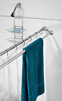 a towel rack with two towels hanging on it