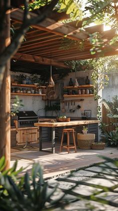 an outdoor kitchen with lots of potted plants