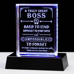 a glass plaque that says, a truly great boss is hard to find