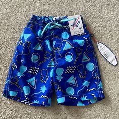 Boys Swim Shorts Size 4t Playful Blue Swim Trunks For Summer, Fun Blue Swim Trunks For Beach Season, Playful Blue Beach Shorts, Playful Blue Swim Trunks With Elastic Waistband, Fun Blue Shorts For Vacation, Playful Blue Shorts For Beach Season, Casual Swim Trunks For Summer Playwear, Casual Summer Swim Trunks For Playwear, Playful Blue Bottoms For Beach Season