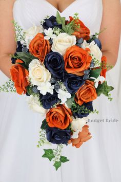 a bridal bouquet with orange, white and blue flowers