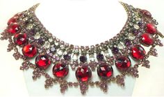 Vintage Red Jewelry With Rhinestones, Vintage Red Jewelry With Stones, Red Rhinestone Evening Necklaces, Red Rhinestone Necklaces For Evening, Red Rhinestone Evening Necklace, Vintage Red Stone Jewelry, Evening Red Rhinestone Necklace, Vintage Red Rhinestone Jewelry, Rhinestone Statement Necklace