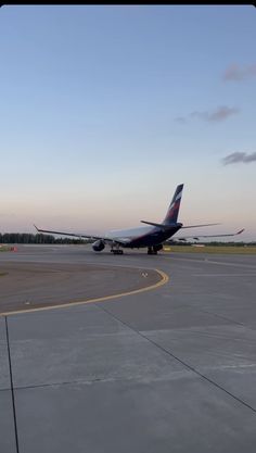 an airplane that is sitting on the runway