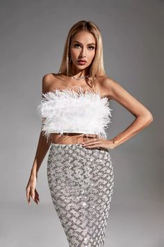 Sleeveless Feather Trim Party Tops, Flirty White Crop Top For Party, Glamorous White Sequined Crop Top, Fitted Party Tops With Feather Trim, Glamorous Feather Trim Top For Night Out, Glamorous Party Top With Feather Trim, Fitted Sleeveless Feathered Tops, Fitted Sleeveless Feather Tops, Summer Party Tops With Feathers