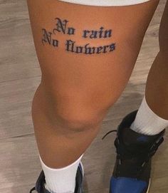 a person with a tattoo on their leg