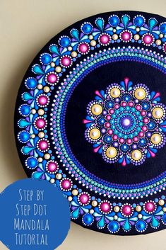 a painting on a plate with the words step by step dot mandal written below it