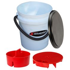 a white bucket with red handles next to a plastic cup and strainer on a white background