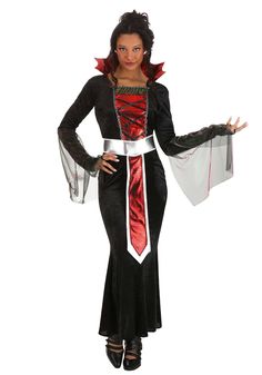 a woman dressed in a costume with red and black accents