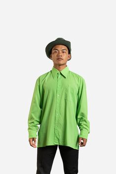 True vintage striking bright green plain shirt by Bolden Style featuring the classic pointed collar of the 70s with patch chest pocket. Imported.                                                                                                                                                                                                                                                                                                                                         * Button through Classic Green Shirt For Work, Green Workwear Shirt With Spread Collar, Green Shirt With Button Cuffs And Spread Collar, Green Shirt With Spread Collar For Work, Green Shirt With Relaxed Fit And Spread Collar, Retro Solid Color Shirt With Button Closure, Retro Green Collared Shirt, Retro Solid Shirt With Button Closure, Retro Green Shirt For Spring