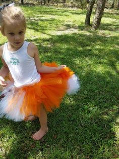 This fox tutu is the perfect completion to an adult or little one's costume ! Whether it's for purim, Halloween, or a woodland themed birthday party! TAIL IS OPTIONAL Sparking strips are placed throughout to add that extra glamour! ( glitter tulle may vary from dotted or scattered, due to suppliers availability) If you do not see your size please send me a message and I'll be glad to accommodate you . IDEAS: If you have a certain animal or different tutu in mind message me. I love new, custom id Women Fox Costume, Adult Fox Costume, Kids Fox Costume, Orange Tulle Tutu Party Dress, Women’s Fox Costume, Star Fox, Tulle Tutu, Birthday Tutu, Purim