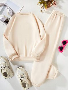 Casual Cream Sets For Fall, Long Sleeve Fleece Sets For Fall, Fall White Crew Neck Sets, Casual Fleece Sets For Loungewear, Casual Fleece Loungewear Sets, Solid Color Crew Neck Tracksuit For Fall, Casual Crew Neck Sets For Winter, Casual Winter Sets With Crew Neck, Casual Fleece Sets For Fall