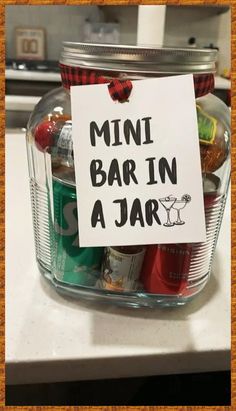 a mini bar in a jar with a sign attached to it that says,'mini bar in a jar '