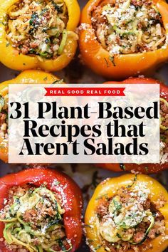 stuffed red peppers with shredded cheese and herbs in them on a baking sheet text reads 31 plant - based recipes that aren't salads