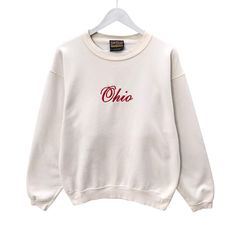 Vintage 90s Ohio State White Sweatshirt Size Large Ohio Buckeyes Crewneck Ohio University Sweater Pullover Embroidered Logo Ohio Jumper by brixtonclothing on Etsy Vintage Crew Sweater With Embroidered Logo, Retro Tops With Embroidered Logo For Fall, Retro Embroidered Sweatshirt For Fall, Retro Fall Sweatshirt With Embroidered Logo, Retro Sweatshirt With Embroidered Logo For Fall, Vintage Crew Neck Sweater With Embroidered Graphics, Vintage Long Sleeve Sweatshirt With Letter Embroidery, 90s Embroidered Long Sleeve Sweatshirt, Vintage Long Sleeve Tops With Embroidered Text