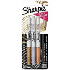 three different types of sharpie pens in packaging on a white background with gold and silver foil