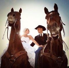 a bride and groom are sitting on two horses with the caption mr and mrs