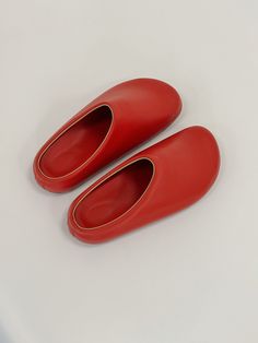 The top of the red clogs for women is made from red genuine leather, adding a touch of elegance to their whimsical aesthetic. Matching the upper, the insole also features a delightful red colour. These red barefoot clogs prioritize comfort with an orthopedic polyurethane sole covered in leather and EVA. The specialized sole provides optimal support, making them ideal for all-day wear. Additionally, the barefoot clogs feature a soft rim that enhances comfort and prevents any discomfort around the Red Flat Slip-ons With Leather Sole, Red Comfortable Slip-on Slippers, Comfortable Red Slip-on Slippers, Red Slip-on Slippers With Rubber Sole, Red Slip-on Slippers With Leather Sole, Red Leather Sole Slip-on Slippers, Comfortable Red Slippers With Rubber Sole, Red Slip-ons With Rubber Sole, Red Slip-on Mules With Rubber Sole