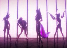 the silhouettes of four female dancers are shown in front of a wall with vertical blinds