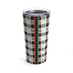 a black and white plaid tumbler cup with red, green, and blue stripes