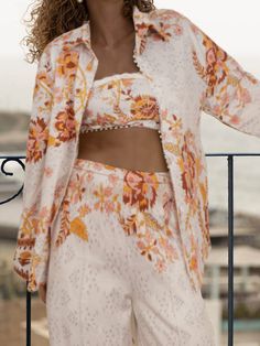 Elevate your summer wardrobe with this sophisticated, resort-inspired oversized shirt in a unique print from LikeMyChoice®. This shirt is printed in cozy hole-in-the-wall fabric with a vibrant floral print that adds a touch of romance. Perfect for a special occasion or a relaxing beach day, this shirt is a stylish choice for any event. See More：Vacation-New-Style @Note:Size: please check measurements carefullyPlease allow 0.5-1" difference due to manual measurementDifferent monitor settings mean Wall Fabric, Relaxing Beach, Unique Vacations, Corset Crop Top, Cocktail Attire, Swimming Outfit, Oversized Blouse, Vacation Style, Work Tops