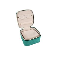 an open green and white case with two compartments