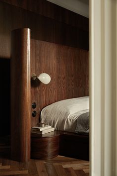 Belgravia Residence is a minimalist house located in London, United Kingdom, designed by Child Studio. In a striking bathroom of emerald-green Verde Guatemala marble, a vanity counter seems to emerge organically from the wall, its curves carved with the precision of water sculpting stone.