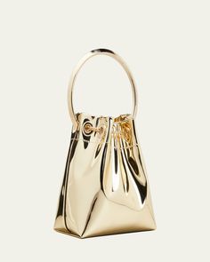 Jimmy Choo bucket bag in metallic faux leather, fabric, and brass hardware    Metal ring top handle, 3.5" drop    Detachable chain shoulder strap, 21.5"L    Drawstring closure with chain tassels     Fabric lining     Approx. 5.9"H x 5.5"W x 3.7"D    "Bon Bon" is made in Italy Chic Gold Bucket Bag For Evening, Handheld Bucket Bag With Gold-tone Hardware For Shopping, Gold Rectangular Bucket Bag For Evening, Metal Shoulder Bag For Evening, Modern Gold Bucket Bag For Evening, Formal Gold Bucket Bag With Detachable Strap, Modern Gold Bucket Bag For Formal Occasions, Chic Metal Shoulder Bag For Formal Occasions, Gold Handheld Bucket Bag For Evening