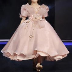 Dress your little one in pure luxury with our DreamyVow Dubai flower girl dress. This stunning gown features intricate beadwork and a gorgeous pink color. Perfect for birthdays, weddings, and pageants, your princess will shine on any special occasion. Make her dreams come true with our Princess Gown J089.