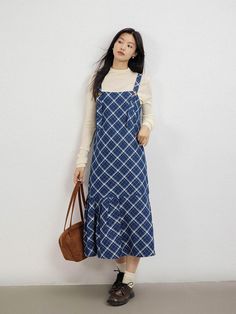 This Blue Plaid Slip Dress is an unique item featuring the blue plaid check pattern to add a classic yet feminine flair to the garment.- Maxi length that makes your look stylish- Skirt design with wide pleats- Square neckline to add appeal to the item Plaid Slip Dress, Stylish Skirts, Check Pattern, Blue Plaid, Skirt Design, Jumpsuit Dress, Slip Dress, Jumpsuit, Plaid