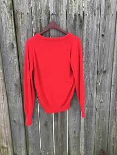 This is an awesome sweater that is ready for a great life. If you want a little style in your life, that will also give you comfort, get this now. It is in great condition and is super soft. There are no rips, holes, stains or smells. Measurements: Pit to pit: 20 inches Collar to bottom front: 18 1/4 inches (from bottom of V-neck to bottom of shirt) Collar to bottom back: 24 inches Sleeve Length (from collar): 30 1/2 inches Size on tag: Medium Classic Red V-neck Sweater For Winter, Vintage Red Crew Neck Sweater, Red Soft Knit Crew Neck Sweater, 90s Red Cotton Sweatshirt, Classic Red V-neck Long Sleeve Sweater, Gold Sweater, Bear Lake, Great Life, Shirt Collar