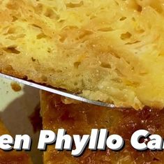 a close up of a piece of food with the words chicken phylo casserole