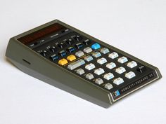 a calculator sitting on top of a white table