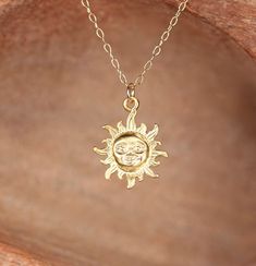 Smiling sun necklace - you are my sunshine - sunshine necklace - gold sun - a gold vermeil sun pendant on a 14k gold filled chain - MD A happy gold vermeil sun charm hanging from a 16 inch 14k gold filled chain. Please feel free to select a different length chain if you prefer! This sun is also available in sterling silver! Sun measurements: 16mm Looking for a smaller sun? https://www.etsy.com/listing/249524174/sun-necklace-sunshine-necklace-gold-sun?ref=listings_manager_grid Looking for other c Dainty Sun Design Necklace For Everyday, Dainty Everyday Necklaces With Sun Design, Dainty Sun And Moon Design Charm Necklaces For Everyday, Everyday Dainty Sun And Moon Charm Necklaces, Dainty Sun And Moon Design Charm Necklaces, Everyday Sun-shaped Jewelry With Sun Design, Gold Dainty Sun Design Charm Necklace, Dainty Gold Charm Necklace With Sun Design, Dainty Gold Sun-shaped Necklace