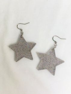 Sparkle Star Earrings – retroelo Trendy Silver Star Earrings, Handmade Trendy Silver Plug Earrings, Trendy Handmade Silver Plug Earrings, Trendy Star-shaped Earrings As A Gift, Trendy Star-shaped Earrings For Gifts, Star-shaped Stainless Steel Earrings For Gifts, Trendy Silver Star Charm Earrings, Trendy Silver Earrings With Star Charm, Star Shaped Stainless Steel Earrings For Gifts