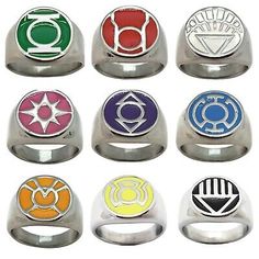 six rings with different colors and symbols on each one, including the symbol for power rangers