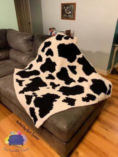 a couch with a blanket on top of it