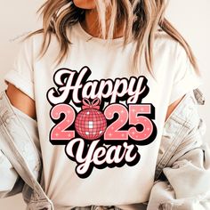 a woman wearing a happy new year t - shirt