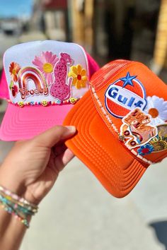 Cute new addition to your Trucker Hats! Add a fun smiley chain along the bottom of your hat to add a little extra personality to your hat. Choose from Pearl or Mixed Bead. Truckers Hats, Hat Chain, Hat Bar, Patch Hats, Custom Trucker Hats, Cap Ideas, Boho Shops, Hat Ideas, Product Development