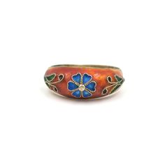 Vintage gilt sterling and enamel flower dome ring. An orangey-red background with a little blue flower and green leaves. Marked "925S" and tested to guarantee sterling silver.  In good vintage condition with patina expected with age.   Size: 4.75 (will adjust slightly up or down) Measures: .29" tall Weight: 2 grams  Please feel free to contact me with questions and/or for additional photos. More Chinese export pieces in the shop: Purple with red flower - https://basefare.etsy.com/listing/1722810 Flower-shaped Enamel Ring For Gift, Flower-shaped Enamel Ring As Gift, Floral Enamel Ring As Gift, Flower Shaped Enamel Ring As A Gift, Flower Shaped Enamel Ring For Gift, Adjustable Flower Enamel Ring As Gift, Adjustable Red Enamel Rings, Handmade Vintage Style Enamel Ring, Handmade Enamel Vintage Rings